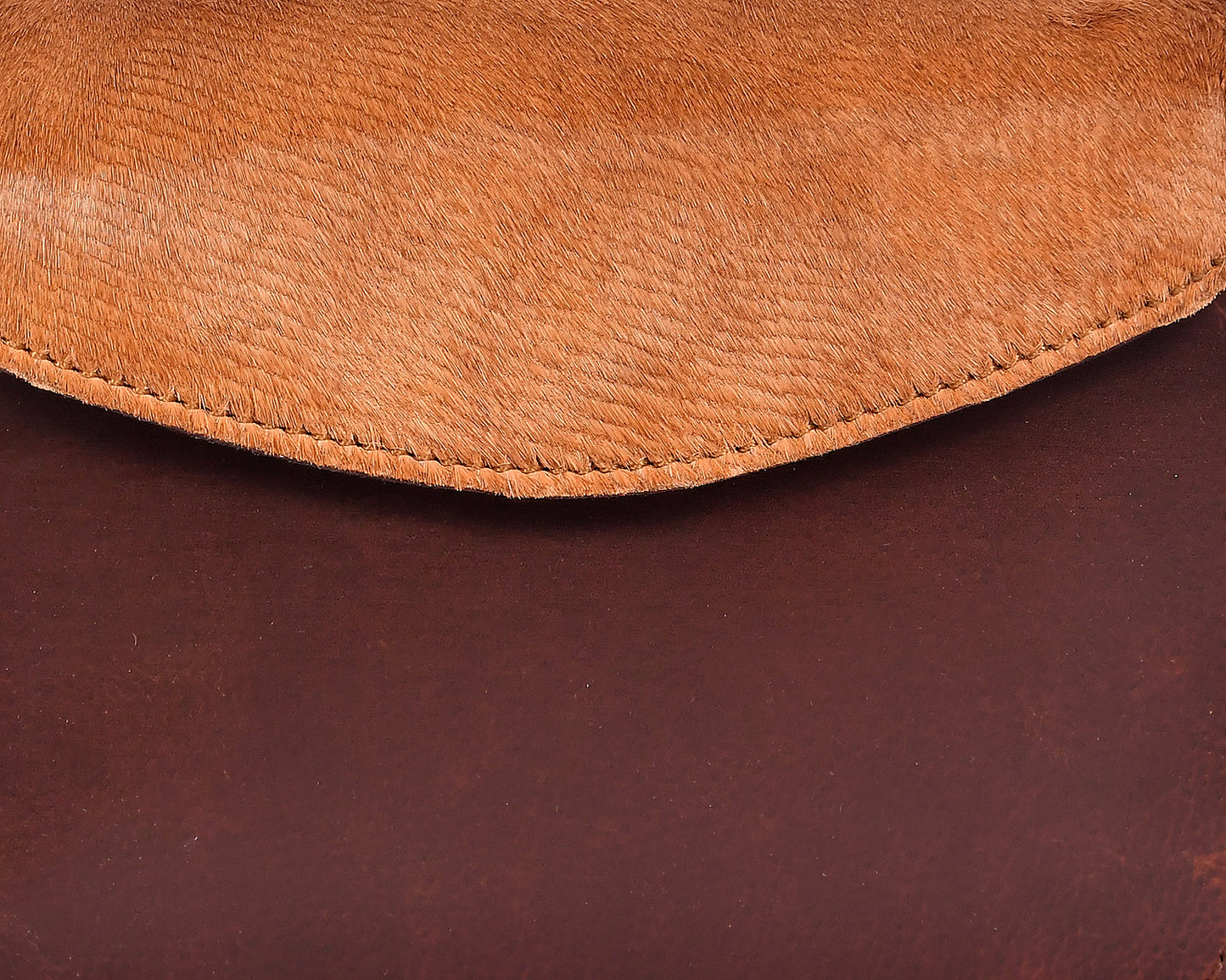 Elevate Your Style with our Brown Leather Sling Bag with Hair-On Detailing. Art: BG-1450 Pack of 25