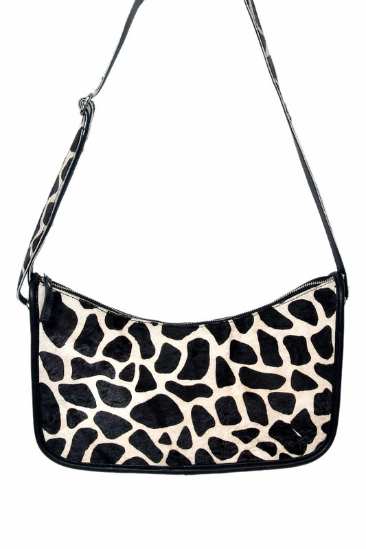 Elevate Your Style with our Black Leather Sling Bag featuring Printed Hair-On Design.  Art: BG-1361 Pack of 25