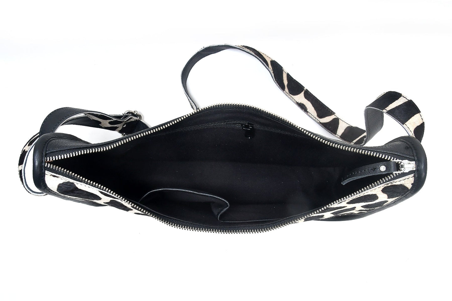Elevate Your Style with our Black Leather Sling Bag featuring Printed Hair-On Design.  Art: BG-1361 Pack of 25
